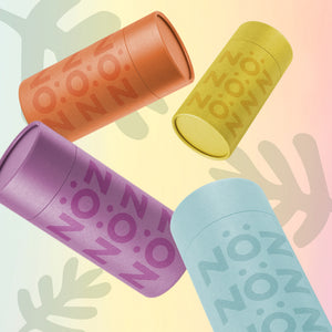 Nose sunscreen in different colors: blue, orange, yellow, pink